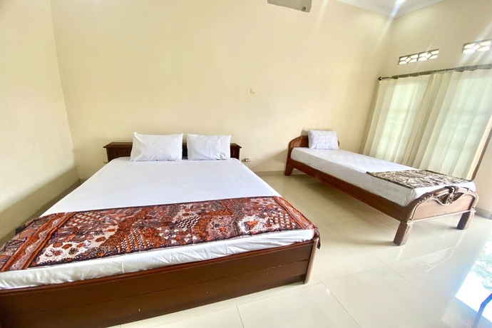 Imagen de la habitación del Hotel OYO 93600 Barong Ijo Homestay Syariah. Foto 13