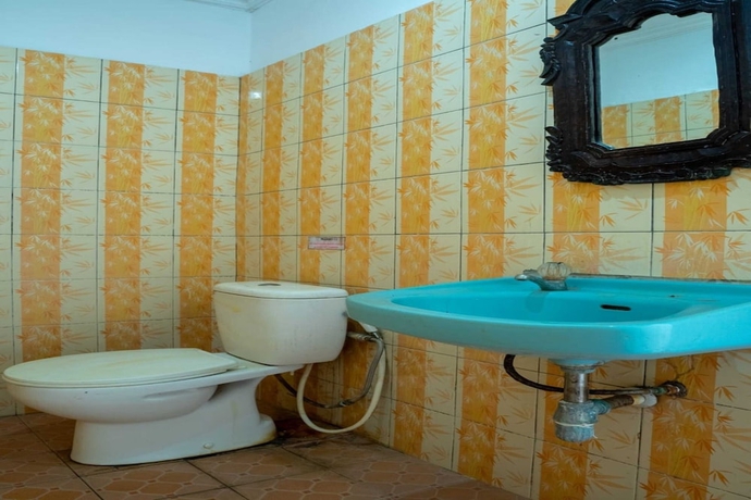 Imagen de la habitación del Hotel OYO 93604 Hepi Bungalow Lovina. Foto 5