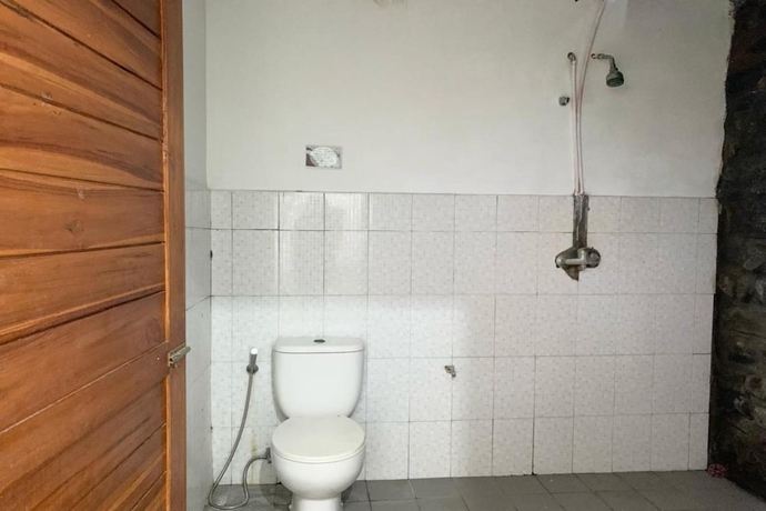 Imagen de la habitación del Hotel OYO 93604 Hepi Bungalow Lovina. Foto 6