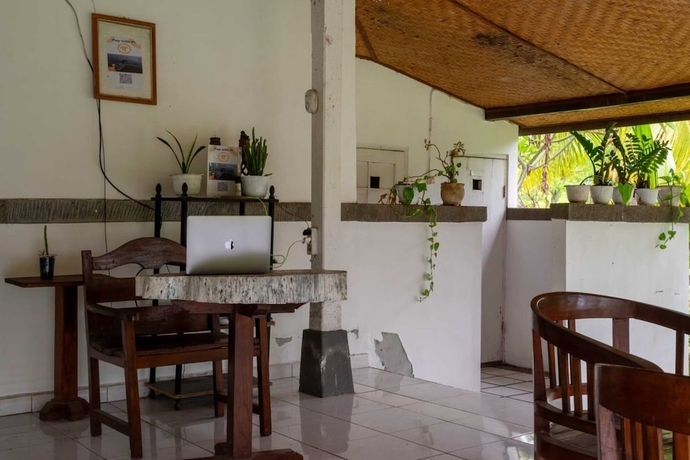 Imagen de los interiores del Hotel OYO 93604 Hepi Bungalow Lovina. Foto 17