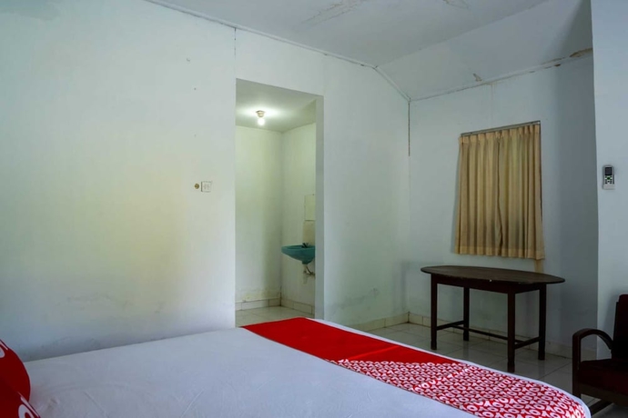 Imagen de la habitación del Hotel OYO 93604 Hepi Bungalow Lovina. Foto 9
