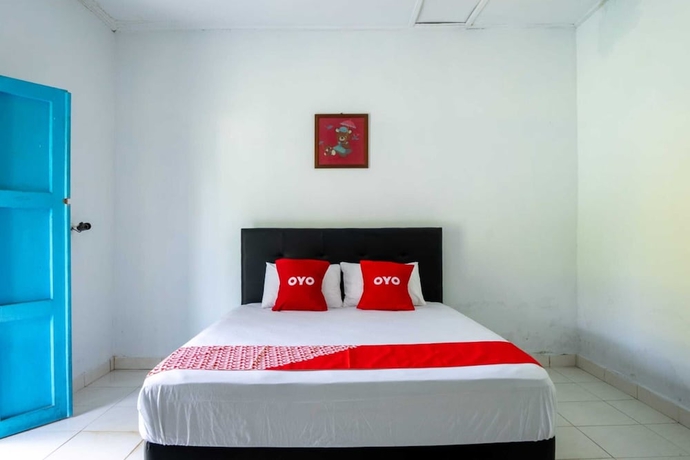 Imagen de la habitación del Hotel OYO 93604 Hepi Bungalow Lovina. Foto 10