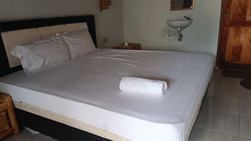 Imagen de la habitación del Hotel OYO 93626 Hi Homestay and Group. Foto 4