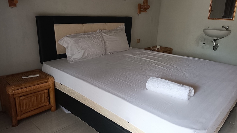Imagen de la habitación del Hotel OYO 93626 Hi Homestay and Group. Foto 5