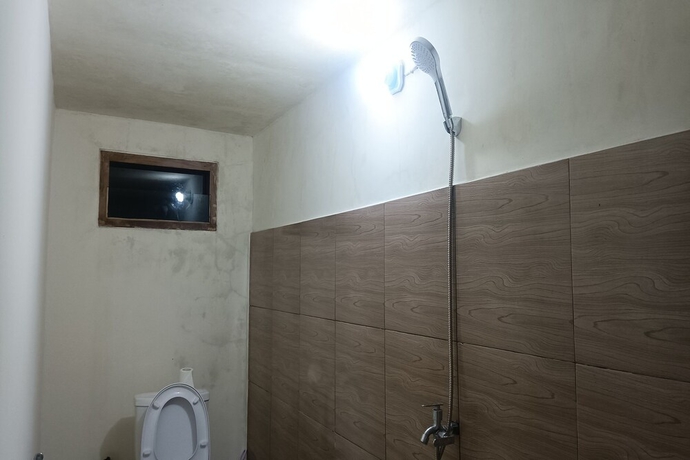 Imagen de la habitación del Hotel OYO 93627 Avocado Homestay. Foto 10