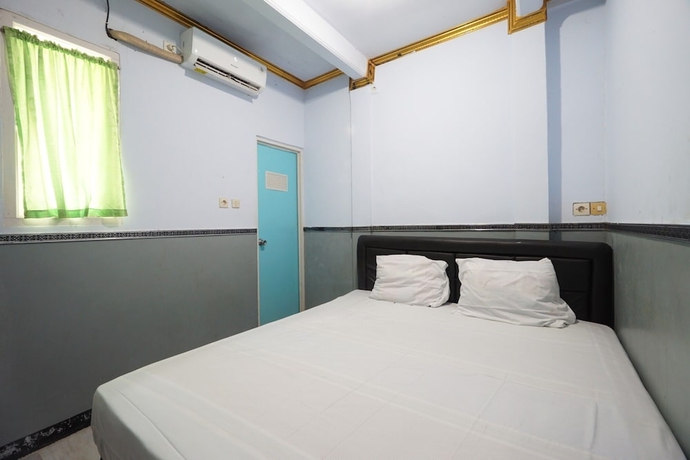 Imagen de la habitación del Hotel OYO 93628 Scorpion Guest House and Beach. Foto 4