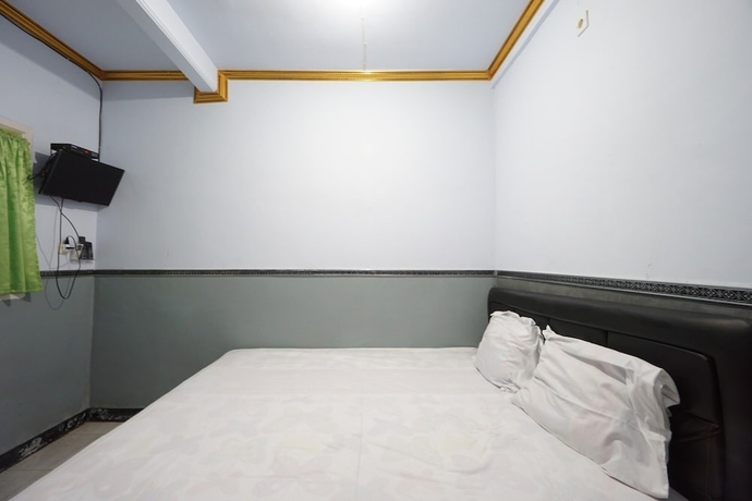 Imagen de la habitación del Hotel OYO 93628 Scorpion Guest House and Beach. Foto 8