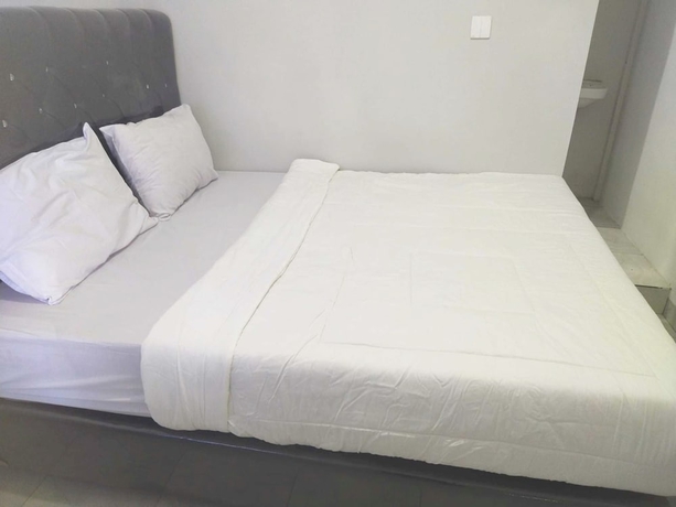 Imagen de la habitación del Hotel OYO 93630 Wongso Residence Syariah. Foto 3