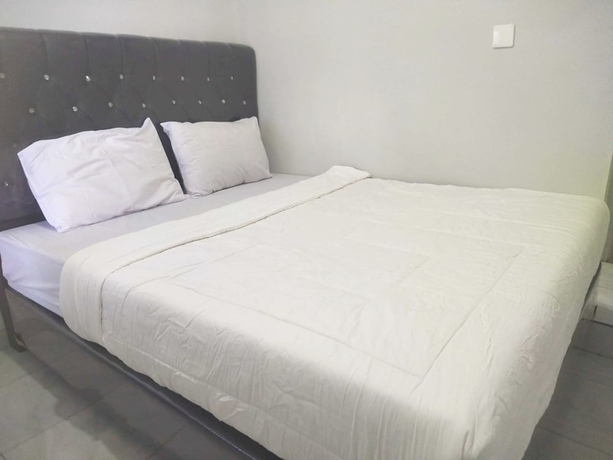 Imagen de la habitación del Hotel OYO 93630 Wongso Residence Syariah. Foto 8