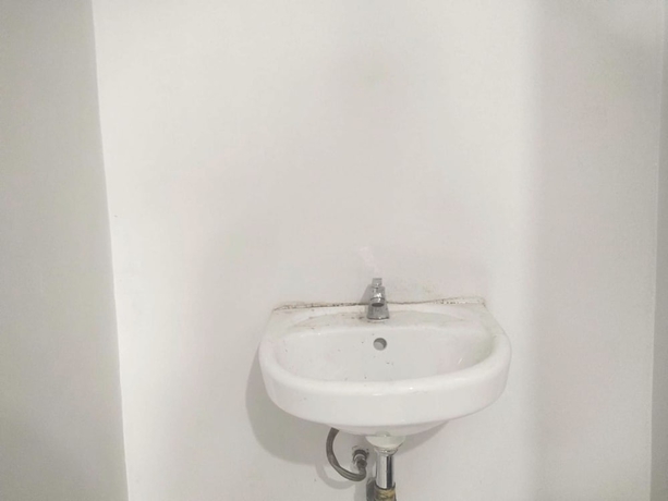 Imagen de la habitación del Hotel OYO 93630 Wongso Residence Syariah. Foto 12