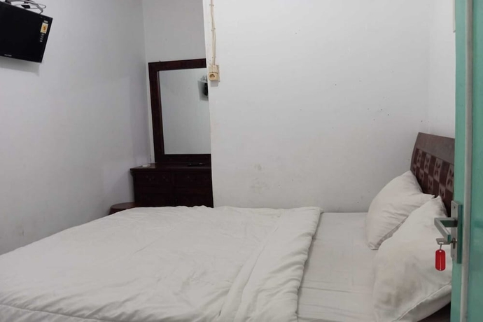 Imagen de la habitación del Hotel OYO 93631 Eltsania Exclusive Homestay. Foto 5