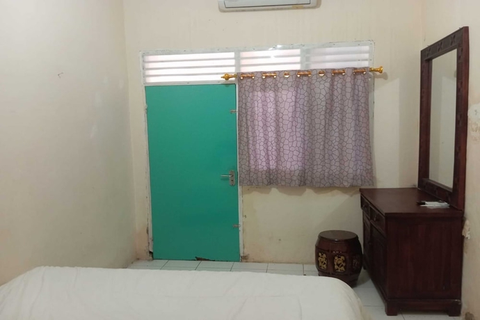 Imagen de la habitación del Hotel OYO 93631 Eltsania Exclusive Homestay Syariah. Foto 2