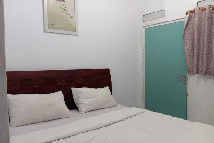 Imagen de la habitación del Hotel OYO 93631 Eltsania Exclusive Homestay Syariah. Foto 3