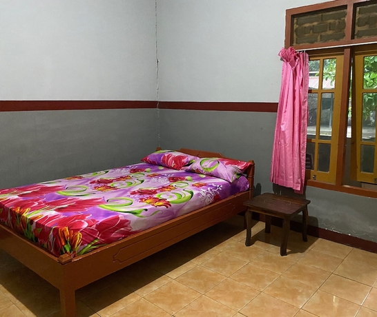 Imagen de la habitación del Hotel OYO 93632 Ramasta Homestay. Foto 5