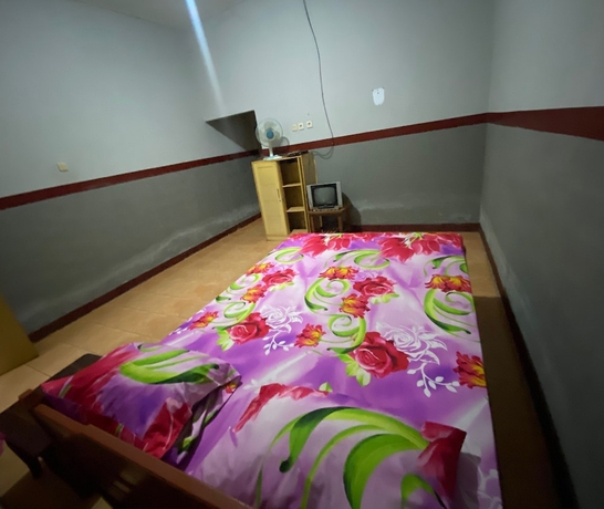 Imagen de la habitación del Hotel OYO 93632 Ramasta Homestay. Foto 6