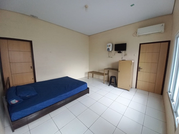 Imagen de la habitación del Hotel OYO 93634 Penginapan D\'palinggihan Syariah. Foto 2