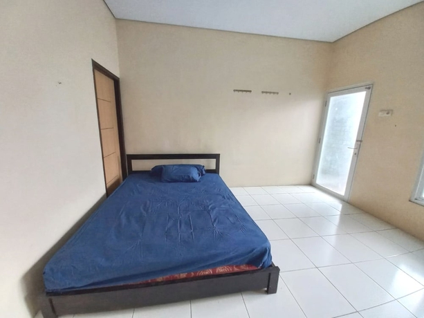 Imagen de la habitación del Hotel OYO 93634 Penginapan D\'palinggihan Syariah. Foto 3