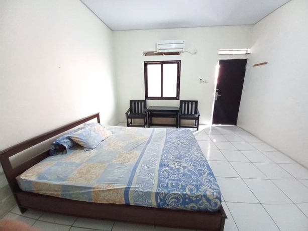 Imagen de la habitación del Hotel OYO 93634 Penginapan D\'palinggihan Syariah. Foto 4