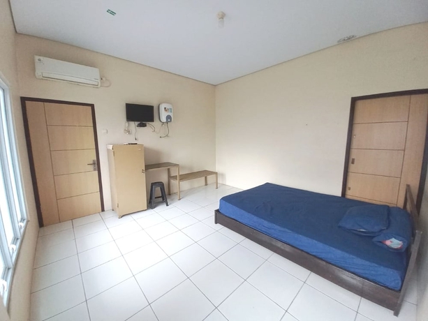 Imagen de la habitación del Hotel OYO 93634 Penginapan D\'palinggihan Syariah. Foto 9