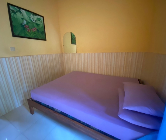 Imagen de la habitación del Hotel OYO 93638 Lotus Guest House. Foto 2