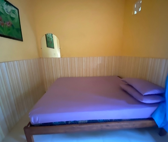 Imagen de la habitación del Hotel OYO 93638 Lotus Guest House. Foto 4