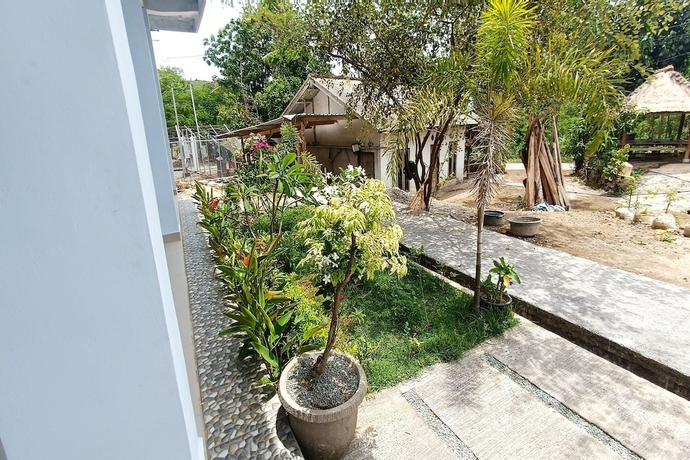 Imagen de la habitación del Hotel OYO 93638 Lotus Guest House. Foto 6