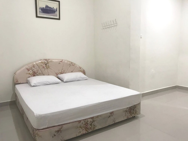 Imagen de la habitación del Hotel OYO 93641 Udayana Guesthouse Syariah. Foto 5