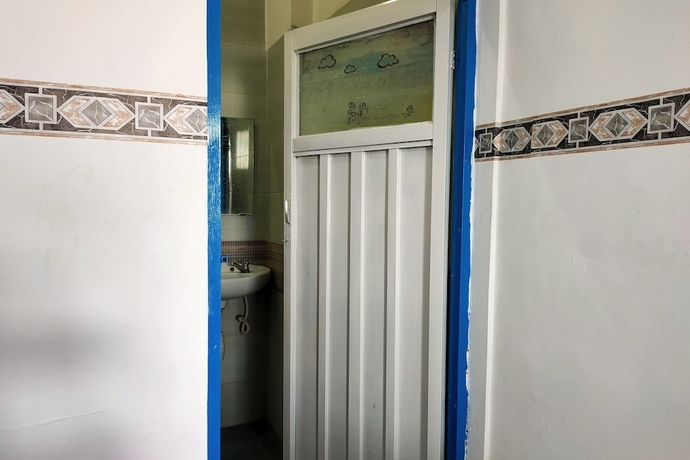 Imagen de la habitación del Hotel OYO 93650 Pondok Baruga 777. Foto 3