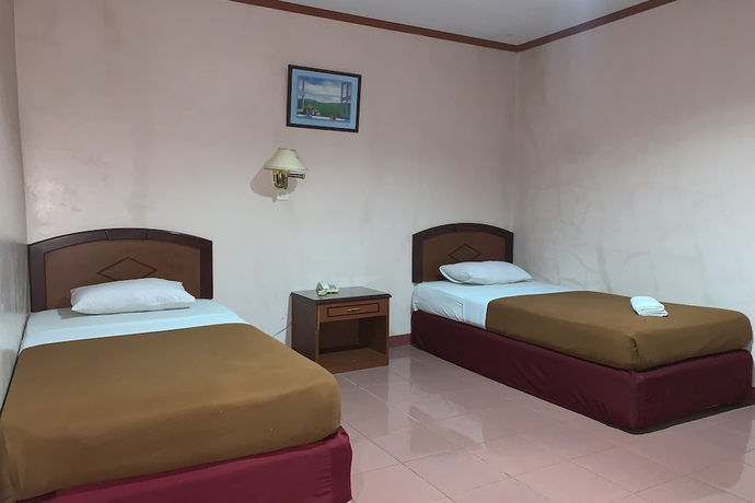 Imagen de la habitación del Hotel OYO 93650 Pondok Baruga 777. Foto 4