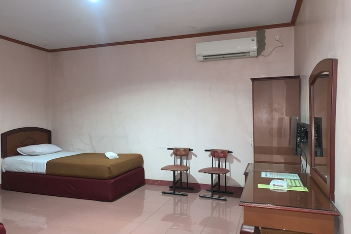 Imagen de la habitación del Hotel OYO 93650 Pondok Baruga 777. Foto 5