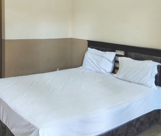Imagen de la habitación del Hotel OYO 93657 Puri Batu Bolong. Foto 2