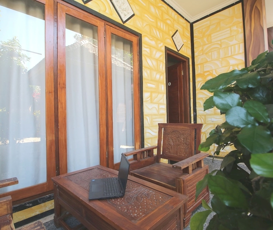 Imagen de los interiores del Hotel OYO 93657 Puri Batu Bolong. Foto 16
