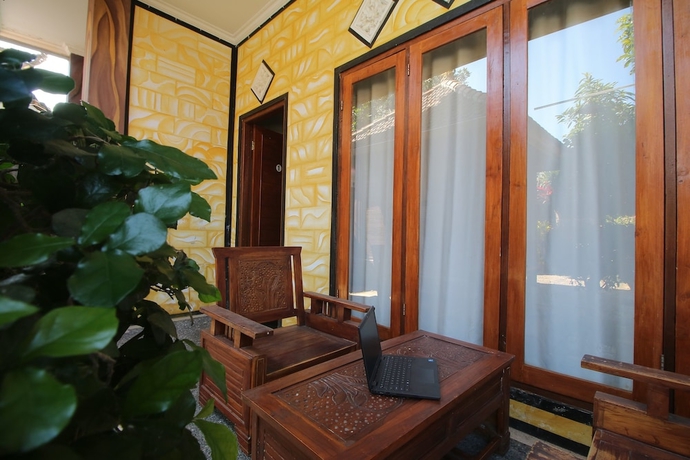 Imagen de los interiores del Hotel OYO 93657 Puri Batu Bolong. Foto 18