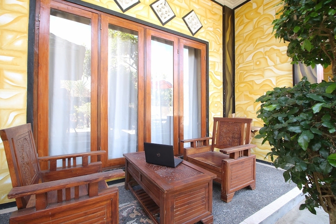 Imagen de los interiores del Hotel OYO 93657 Puri Batu Bolong. Foto 19