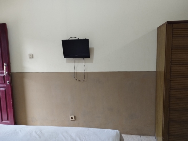 Imagen de la habitación del Hotel OYO 93657 Puri Batu Bolong. Foto 5