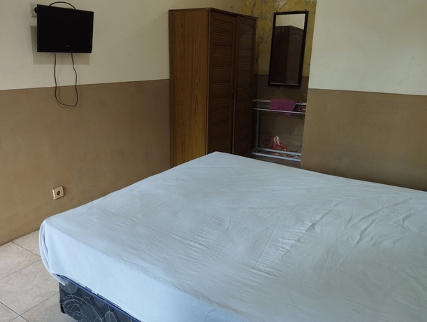 Imagen de la habitación del Hotel OYO 93657 Puri Batu Bolong. Foto 6