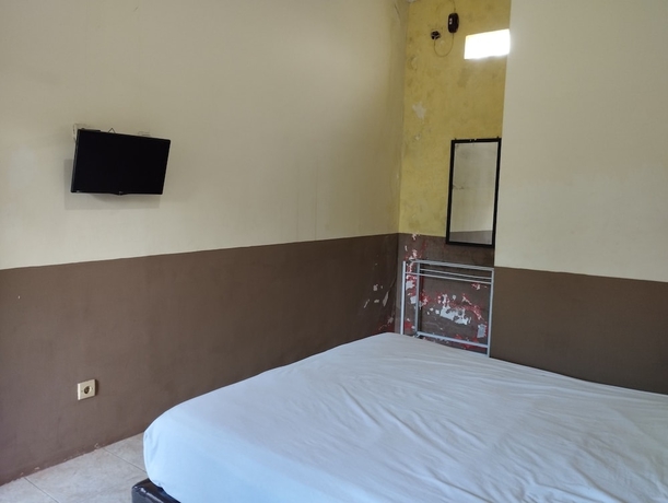Imagen de la habitación del Hotel OYO 93657 Puri Batu Bolong. Foto 7