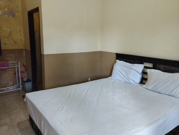 Imagen de la habitación del Hotel OYO 93657 Puri Batu Bolong. Foto 8