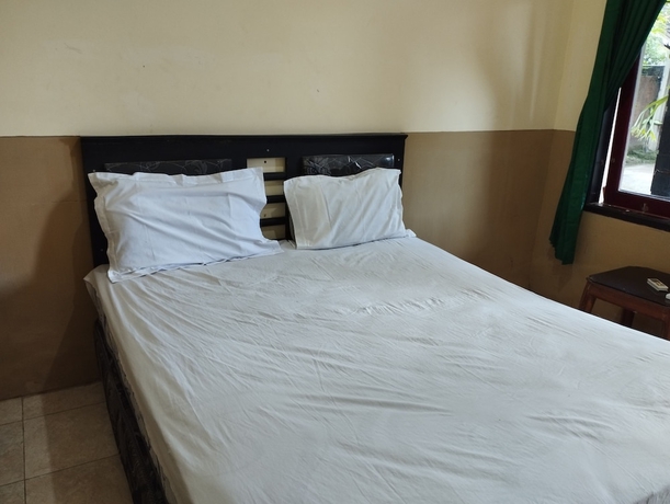 Imagen de la habitación del Hotel OYO 93657 Puri Batu Bolong. Foto 9