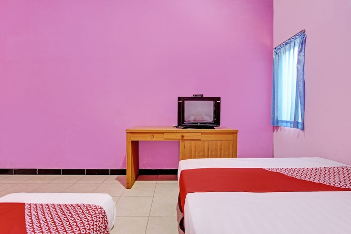 Imagen de la habitación del Hotel OYO 93660 New Family. Foto 2