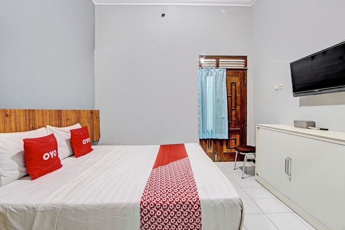 Imagen de la habitación del Hotel OYO 93660 New Family. Foto 11