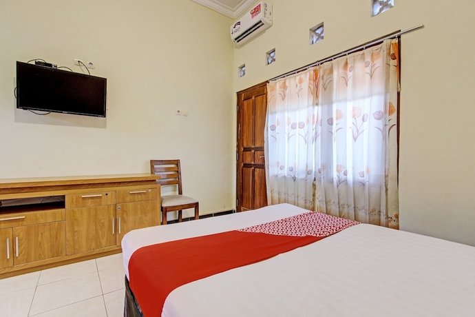 Imagen de la habitación del Hotel OYO 93660 New Family. Foto 13