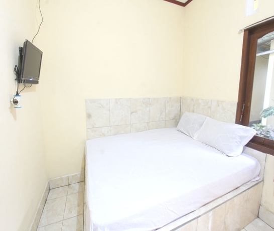 Imagen de la habitación del Hotel OYO 93666 Lestari Homestay. Foto 2
