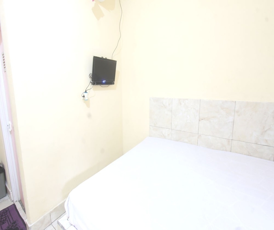 Imagen de la habitación del Hotel OYO 93666 Lestari Homestay. Foto 4