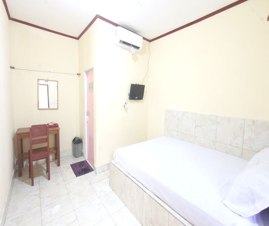 Imagen de la habitación del Hotel OYO 93666 Lestari Homestay. Foto 8
