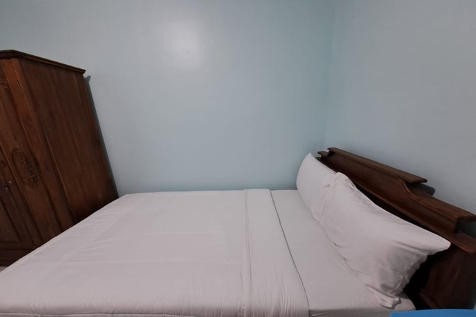 Imagen de la habitación del Hotel OYO 93695 Guest House Riharti Syariah. Foto 13