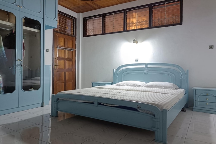Imagen de la habitación del Hotel OYO 93706 Penginapan Syariah Hj. Kenan, Bungo Koto Tuo. Foto 11