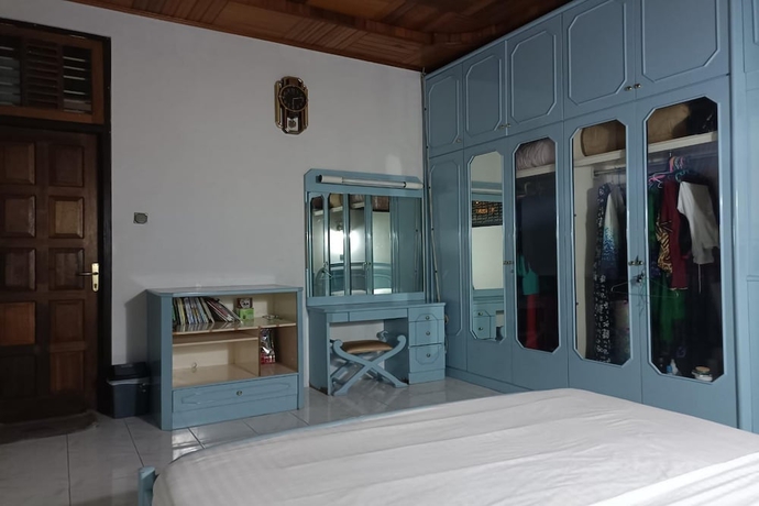 Imagen de la habitación del Hotel OYO 93706 Penginapan Syariah Hj. Kenan, Bungo Koto Tuo. Foto 14