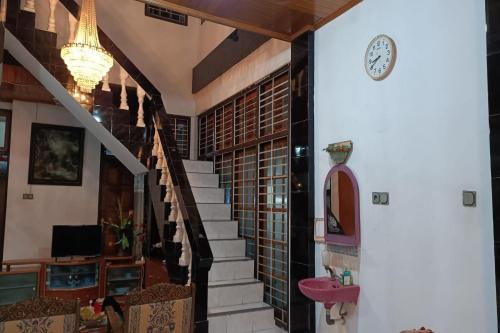 Imagen general del Hotel OYO 93706 Penginapan Syariah Hj. Kenan, Bungo Koto Tuo. Foto 15