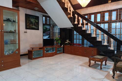 Imagen general del Hotel OYO 93706 Penginapan Syariah Hj. Kenan, Bungo Koto Tuo. Foto 18